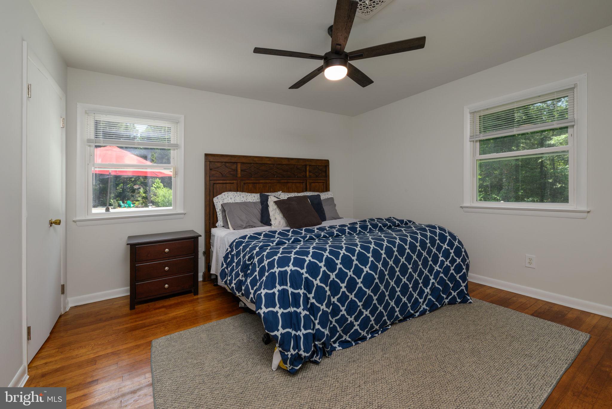 4563 Nutters Cross Road Salisbury, MD 21804 - Photo 48 of 52 a bedroom with a bed and window