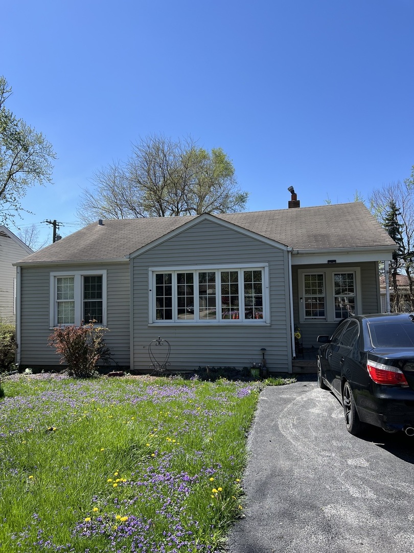 a house view with a garden space