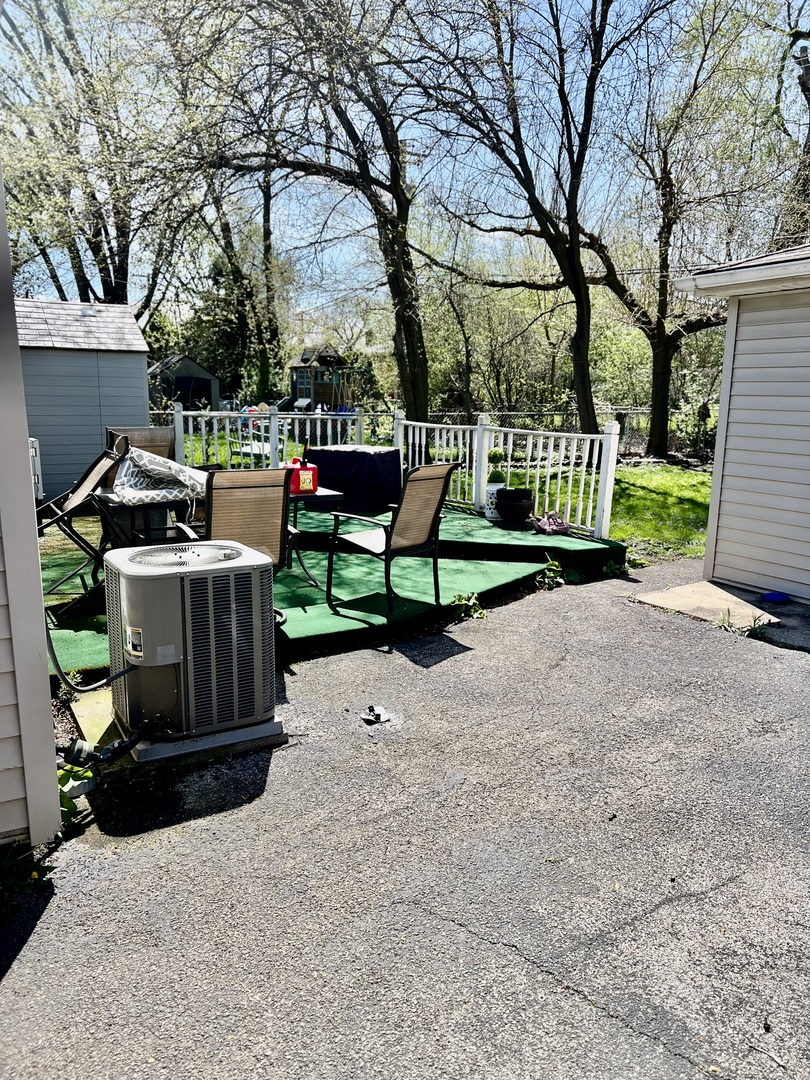 18510 Dixie Highway Homewood, IL 60430 - Photo 11 of 11 a view of a bench in a backyard