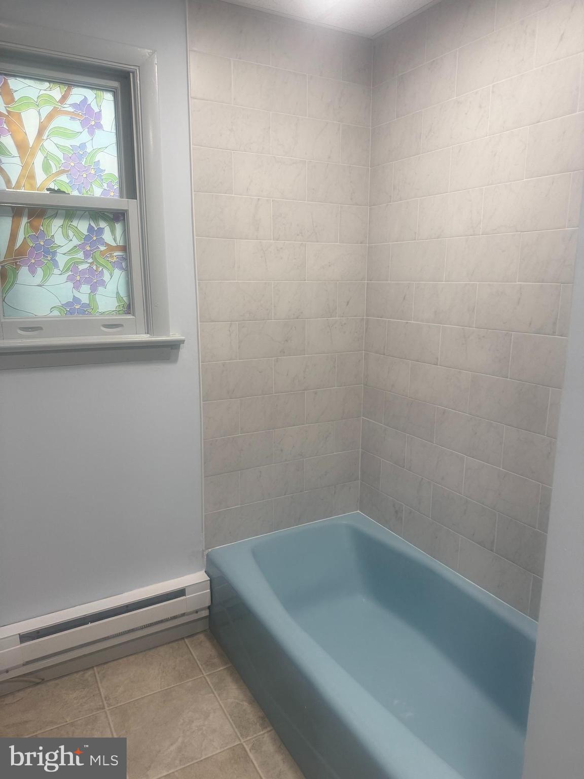 246 South Spruce Street Lititz, PA 17543 - Photo 6 of 6 a bath tub sitting next to a window