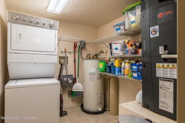 a storage room with washer and dryer
