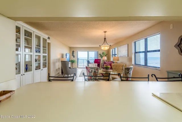 a view of kitchen with furniture and window