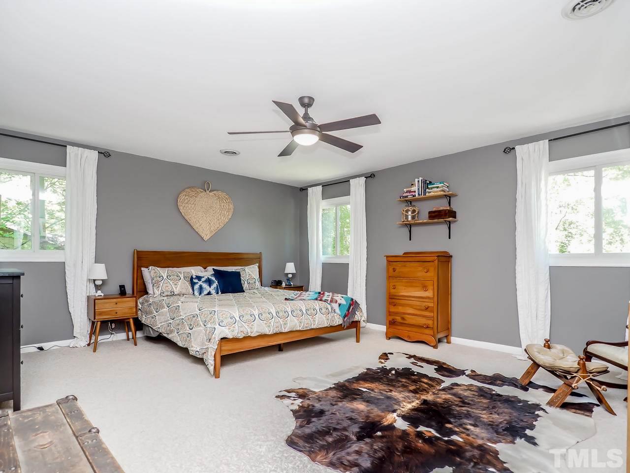 2012 Fawndale Drive Raleigh, NC 27612 - Photo 19 of 27 a bedroom with bed and window