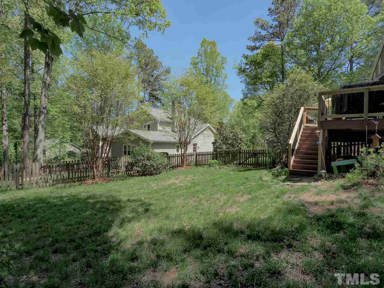 2012 Fawndale Drive Raleigh, NC 27612 - Photo 26 of 27 a view of a house with a backyard