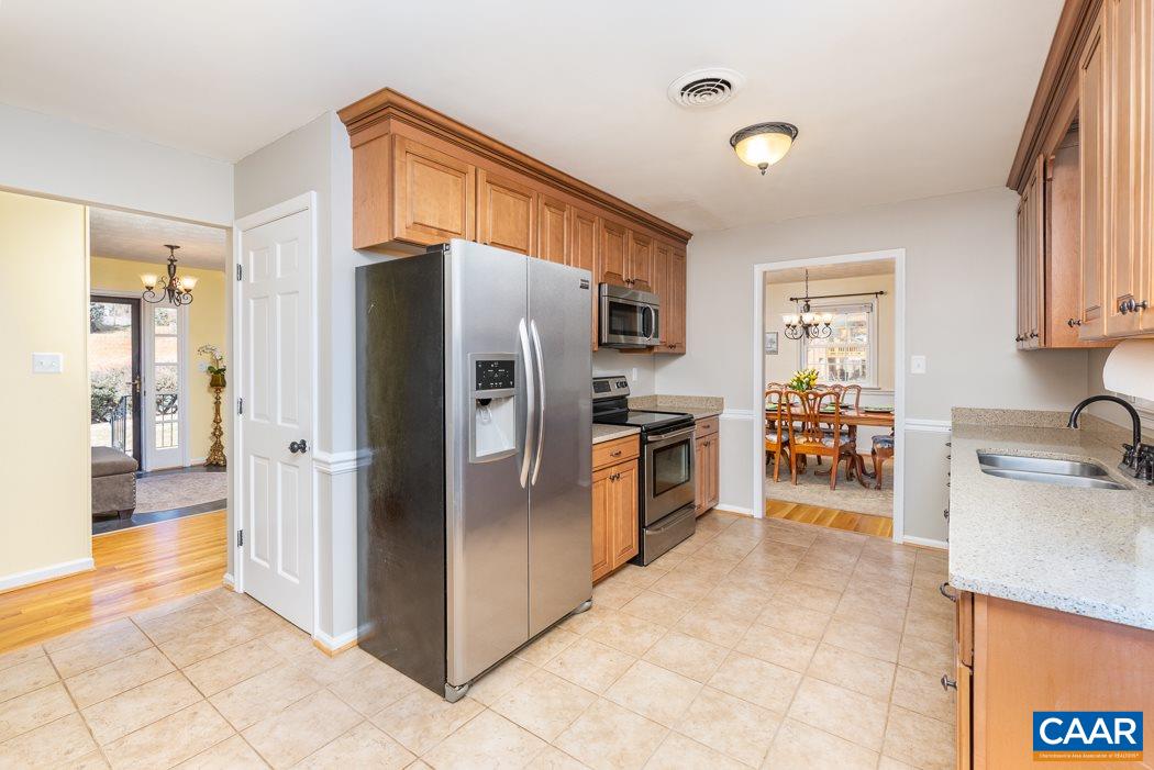2422 Huntington Road Charlottesville, VA 22901 - Photo 13 of 49 a kitchen with stainless steel appliances a refrigerator and a sink