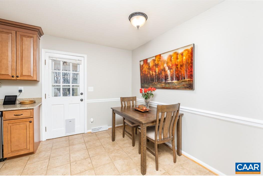 2422 Huntington Road Charlottesville, VA 22901 - Photo 17 of 49 a view of a dining room with furniture and window