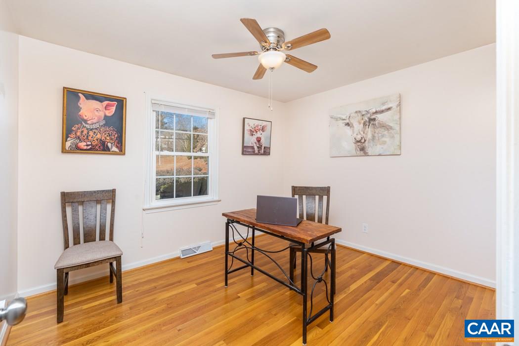 2422 Huntington Road Charlottesville, VA 22901 - Photo 25 of 49 a workspace with wooden floor and a workspace