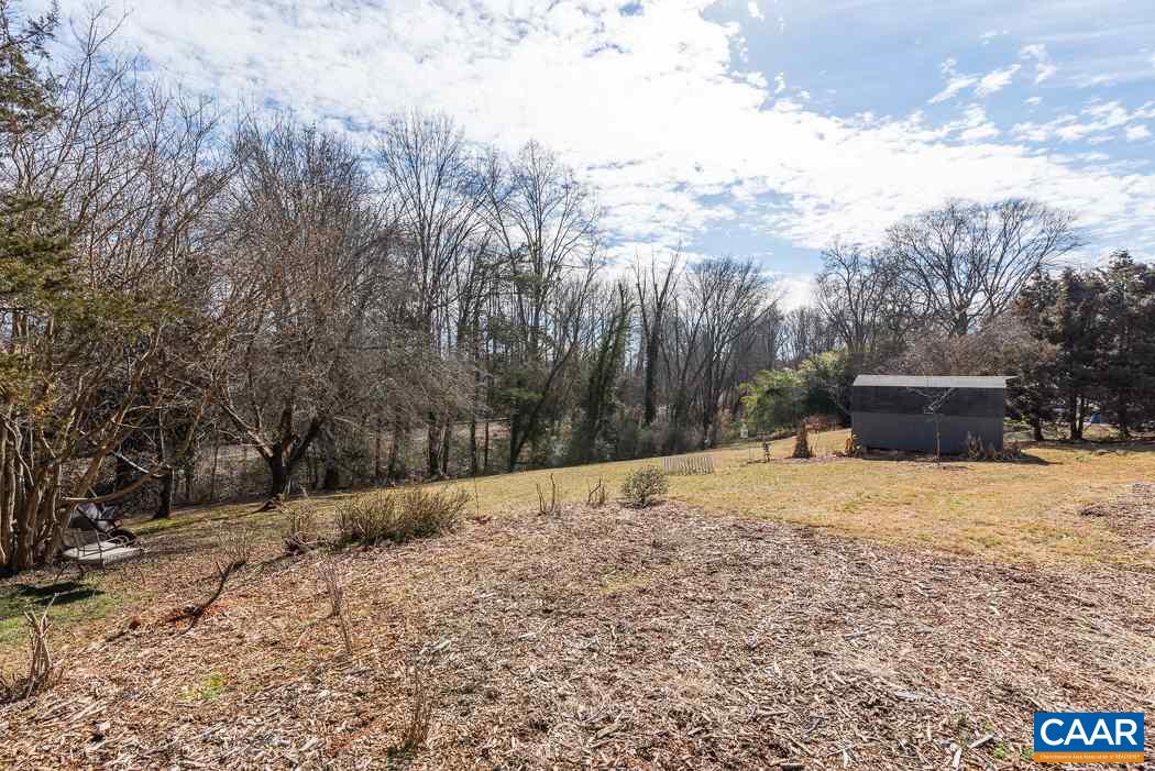 2422 Huntington Road Charlottesville, VA 22901 - Photo 45 of 49 a street view with large trees