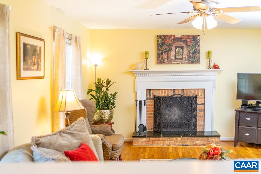 2422 Huntington Road Charlottesville, VA 22901 - Photo 6 of 49 a living room with furniture and a fireplace