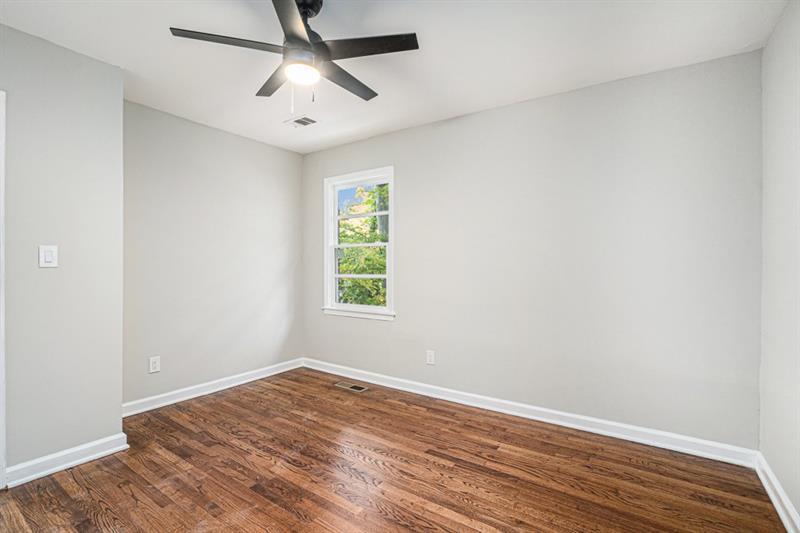 2693 Washington Street Northwest Atlanta, GA 30318 - Photo 15 of 26 wooden floor in an empty room