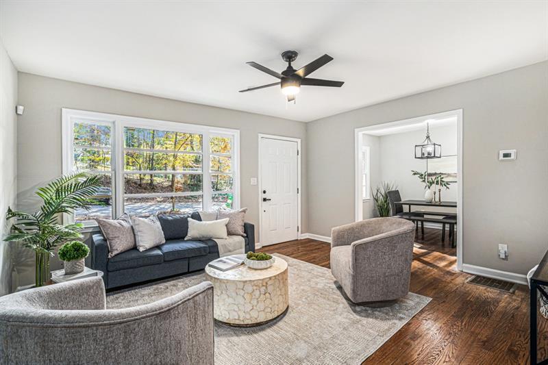 2693 Washington Street Northwest Atlanta, GA 30318 - Photo 2 of 26 a living room with furniture and a large window