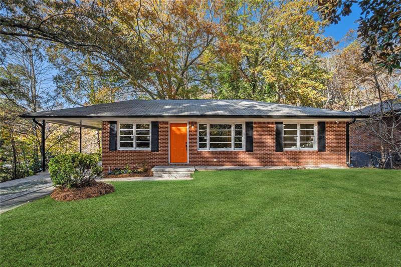 2693 Washington Street Northwest Atlanta, GA 30318 - Photo 24 of 26 front view of a house with a yard