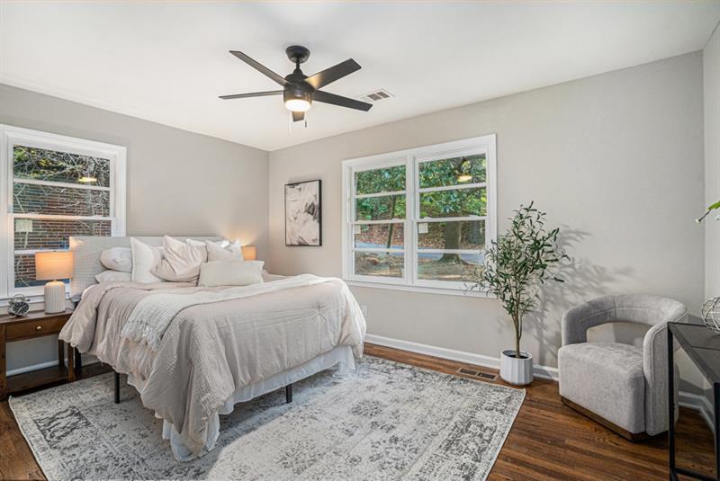 2693 Washington Street Northwest Atlanta, GA 30318 - Photo 4 of 26 a spacious bedroom with a bed and a window