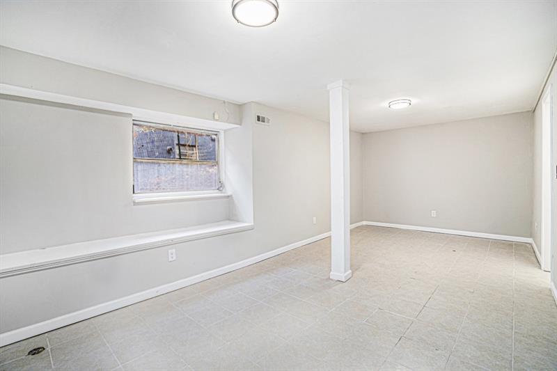 2693 Washington Street Northwest Atlanta, GA 30318 - Photo 6 of 26 a view of an empty room with a window