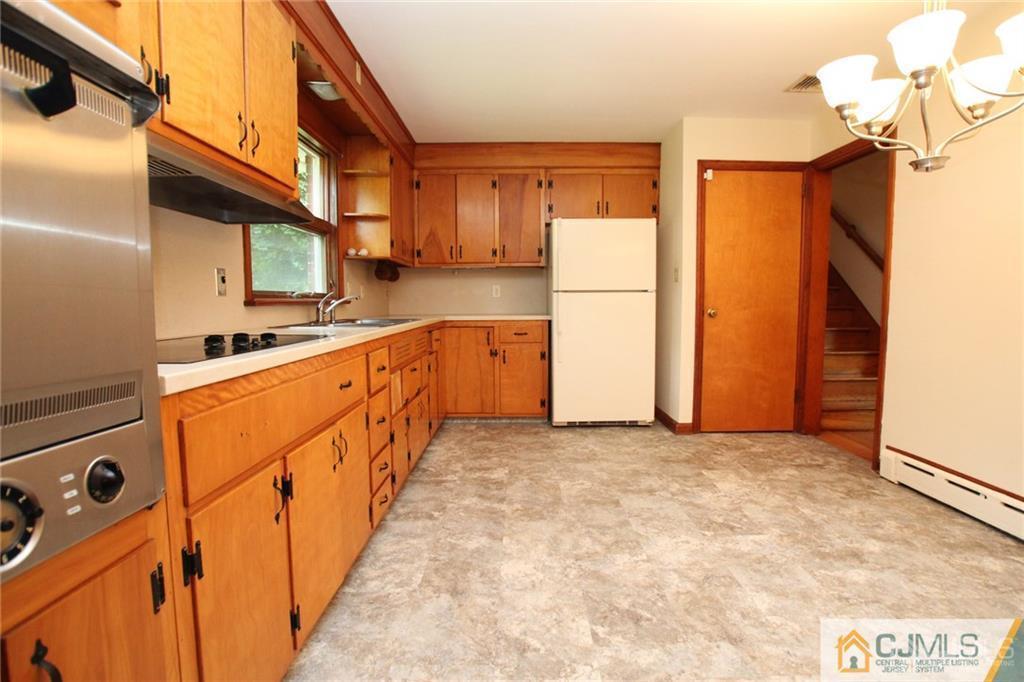 25 Academy Road Somerset, NJ 08873 - Photo 10 of 25 a view of a kitchen with a sink and cabinets