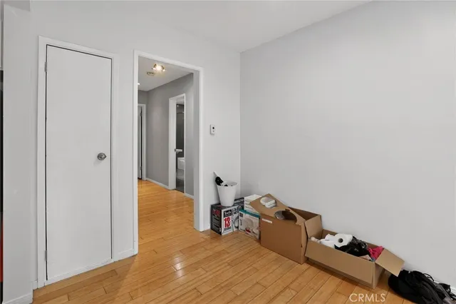 a very nice looking room with wooden floor