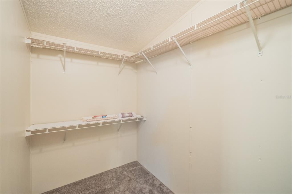 37510 Quail Ridge Circle Leesburg, FL 34788 - Photo 23 of 43 a view of a room with racks on the wall