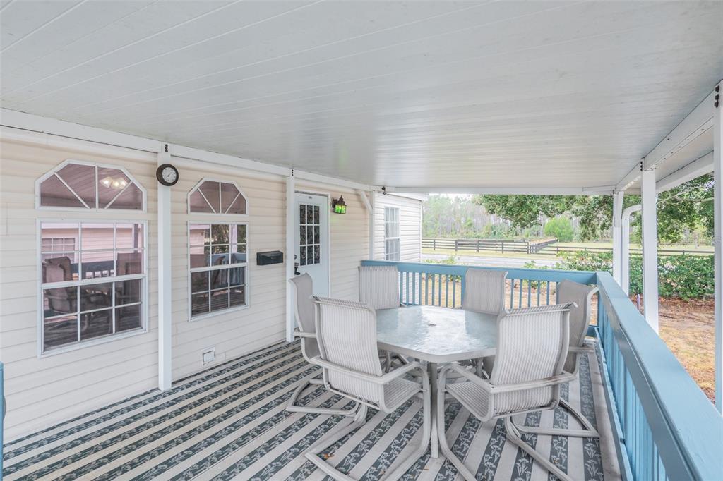 37510 Quail Ridge Circle Leesburg, FL 34788 - Photo 31 of 43 a view of a dining room with furniture window and outside view
