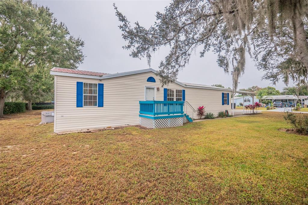 37510 Quail Ridge Circle Leesburg, FL 34788 - Photo 4 of 43 a front view of house with yard and trees