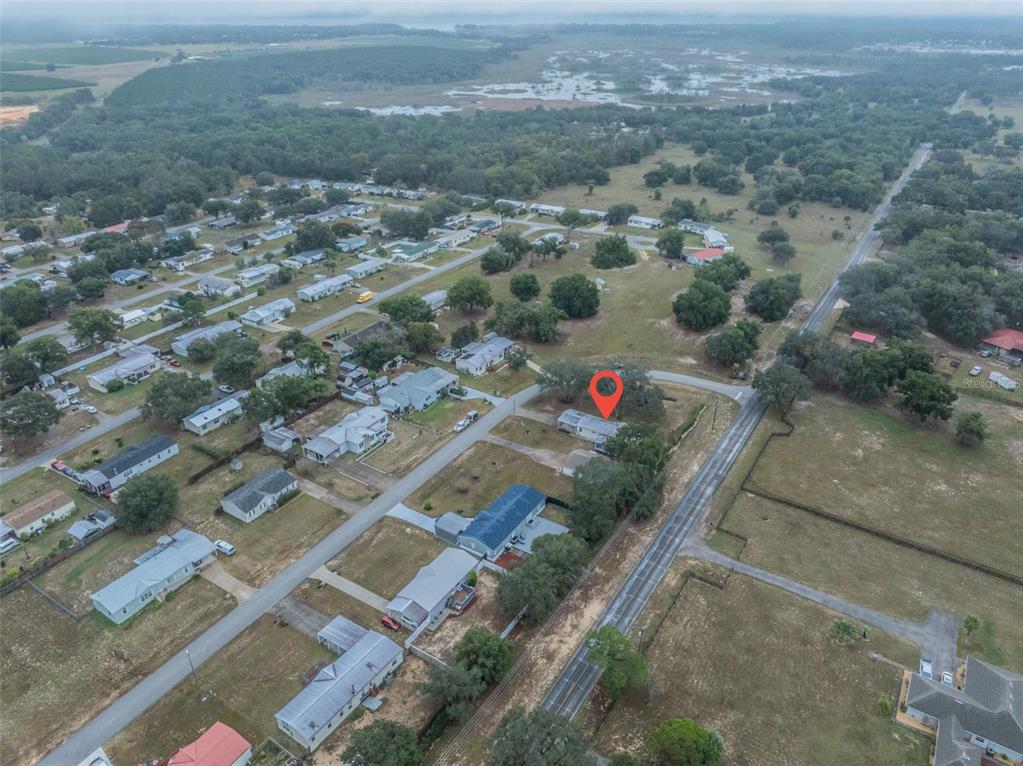 37510 Quail Ridge Circle Leesburg, FL 34788 - Photo 42 of 43 an aerial view of residential houses with outdoor space
