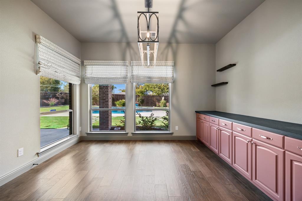 326 Prairie View Road Rockwall, TX 75087 - Photo 17 of 40 wooden floor in an empty room with a window