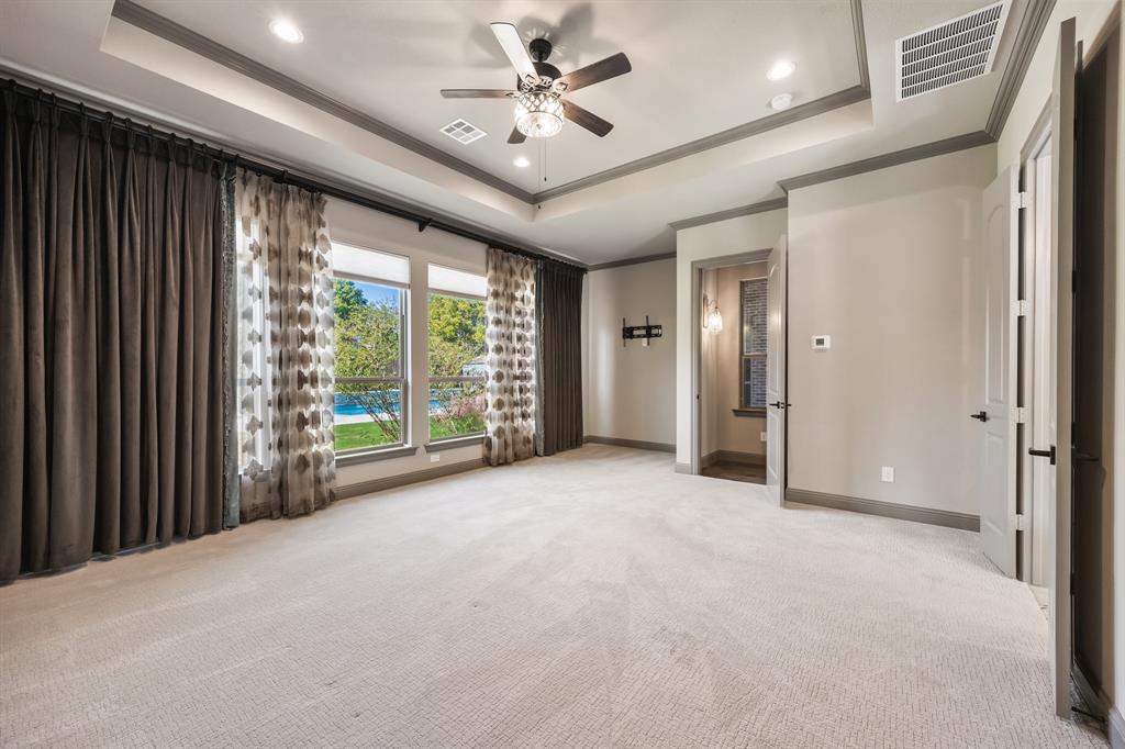 326 Prairie View Road Rockwall, TX 75087 - Photo 18 of 40 a view of a livingroom with a ceiling fan and window