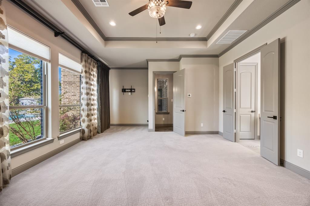 326 Prairie View Road Rockwall, TX 75087 - Photo 19 of 40 an empty room with windows and closet