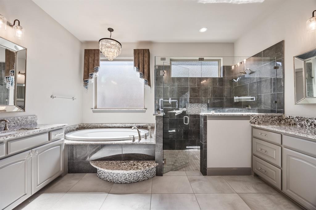 326 Prairie View Road Rockwall, TX 75087 - Photo 24 of 40 a bathroom with a toilet sink and mirror