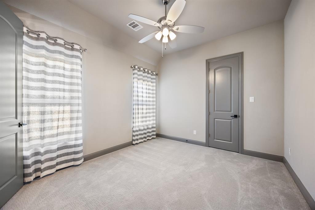 326 Prairie View Road Rockwall, TX 75087 - Photo 29 of 40 an empty room with windows and fan