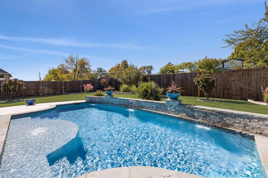 326 Prairie View Road Rockwall, TX 75087 - Photo 31 of 40 a view of a back yard