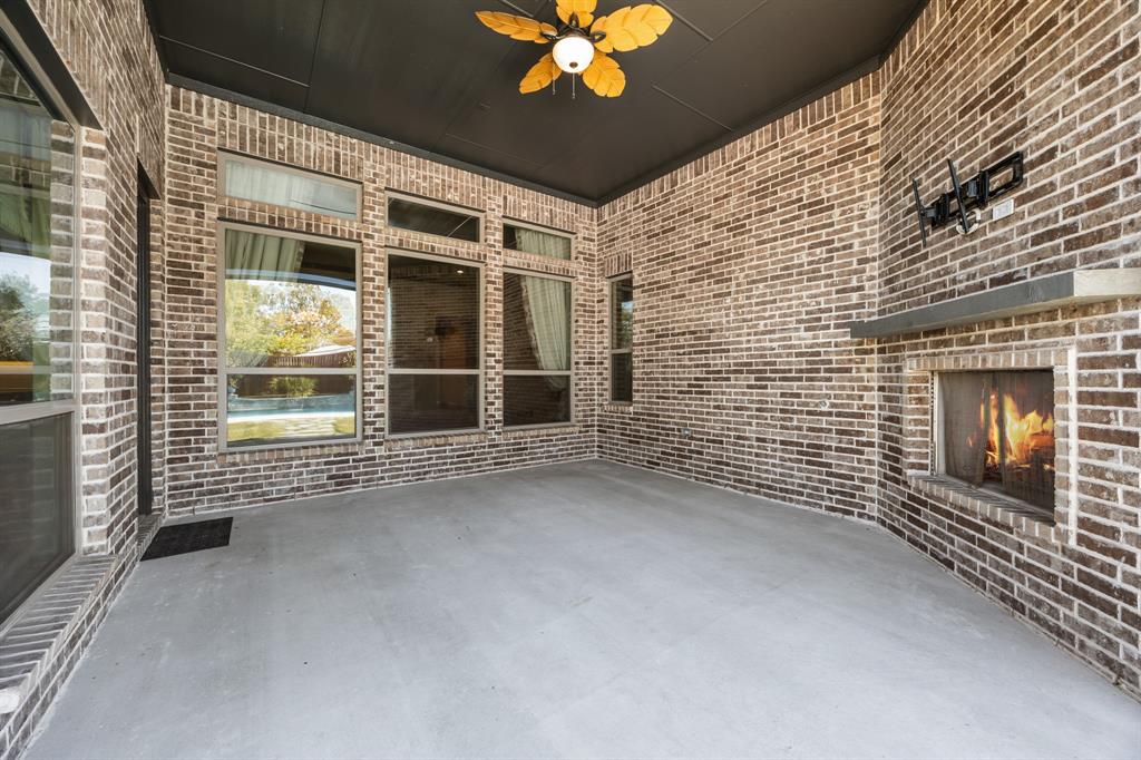 326 Prairie View Road Rockwall, TX 75087 - Photo 39 of 40 a view of a livingroom with a fireplace