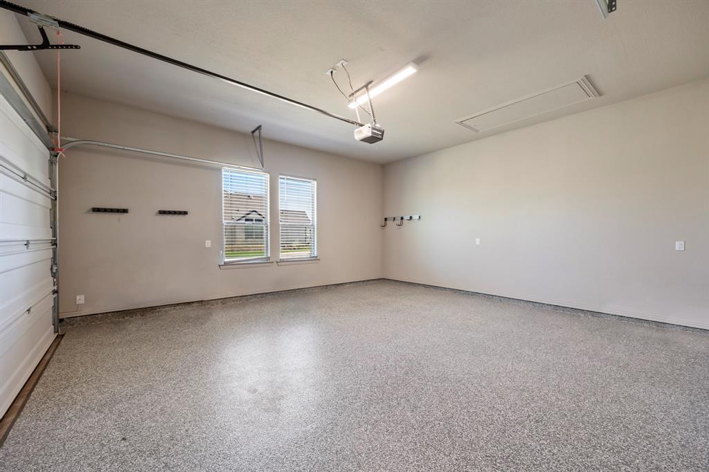 326 Prairie View Road Rockwall, TX 75087 - Photo 40 of 40 a view of a livingroom with an empty space and a ceiling fan