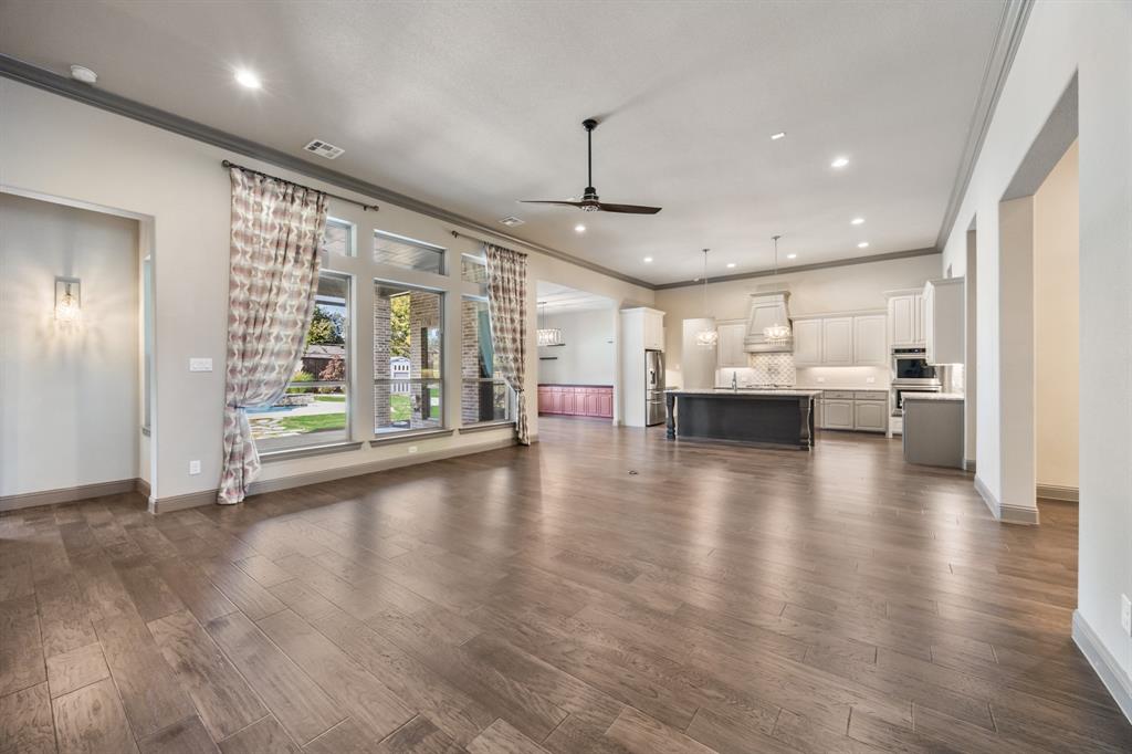 326 Prairie View Road Rockwall, TX 75087 - Photo 5 of 40 a view of kitchen with furniture and wooden floor