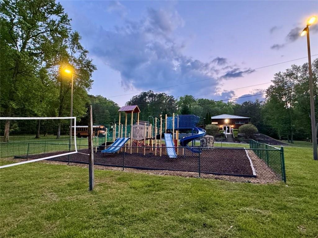 562 Neptune Circle Northeast Ranger, GA 30734 - Photo 14 of 23 a view of a garden with a slide