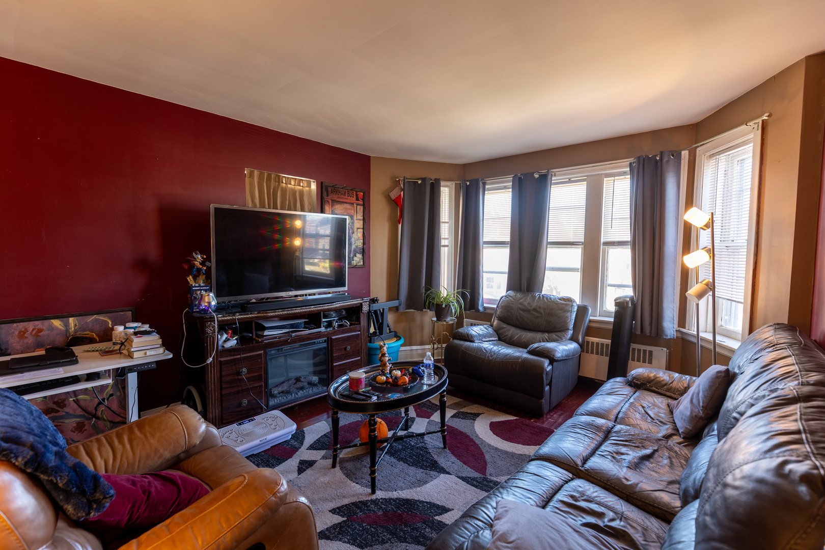 1626 Home Avenue Berwyn, IL 60402 - Photo 2 of 23 a living room with furniture and a flat screen tv
