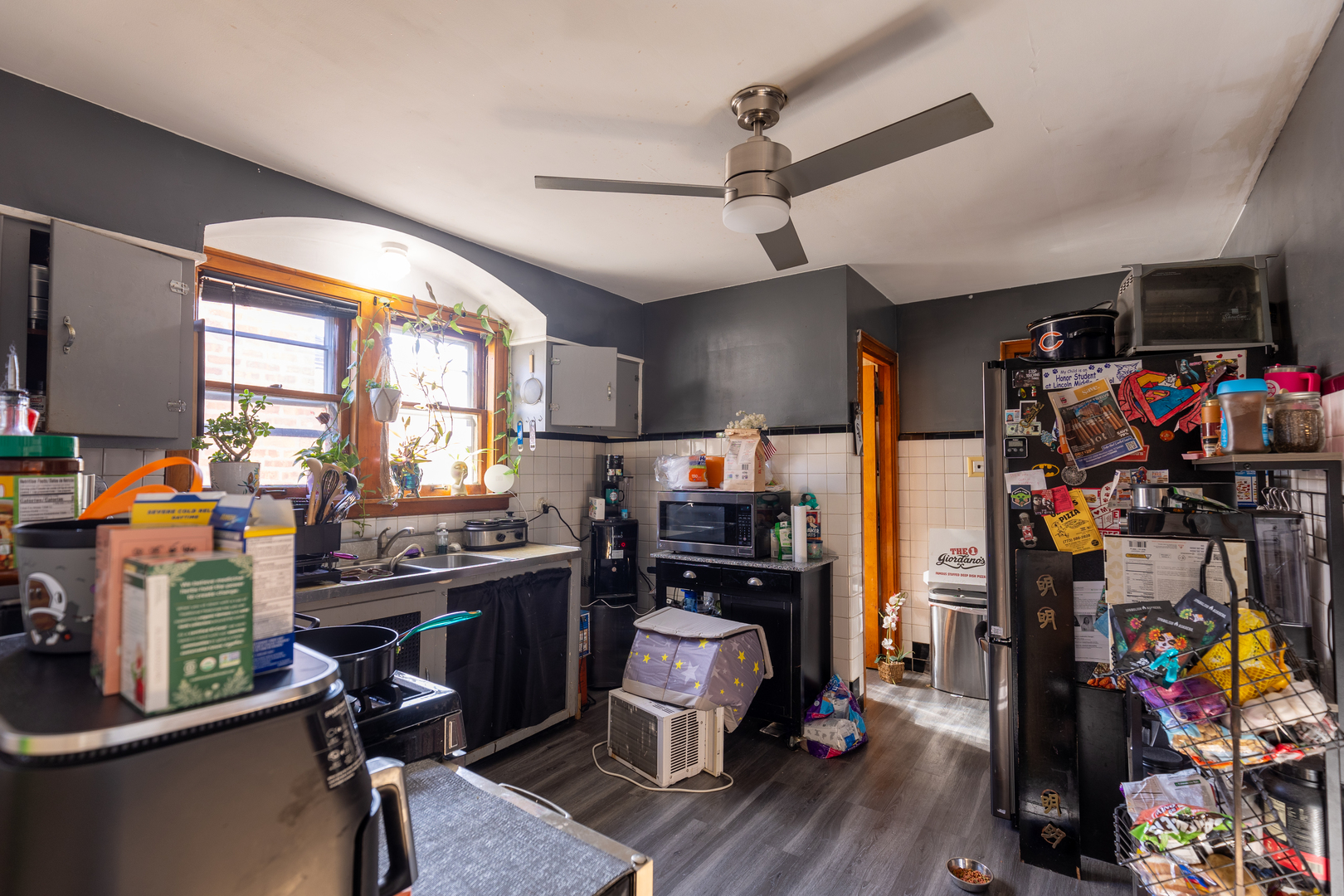 1626 Home Avenue Berwyn, IL 60402 - Photo 5 of 23 a view of a workspace with furniture and a window