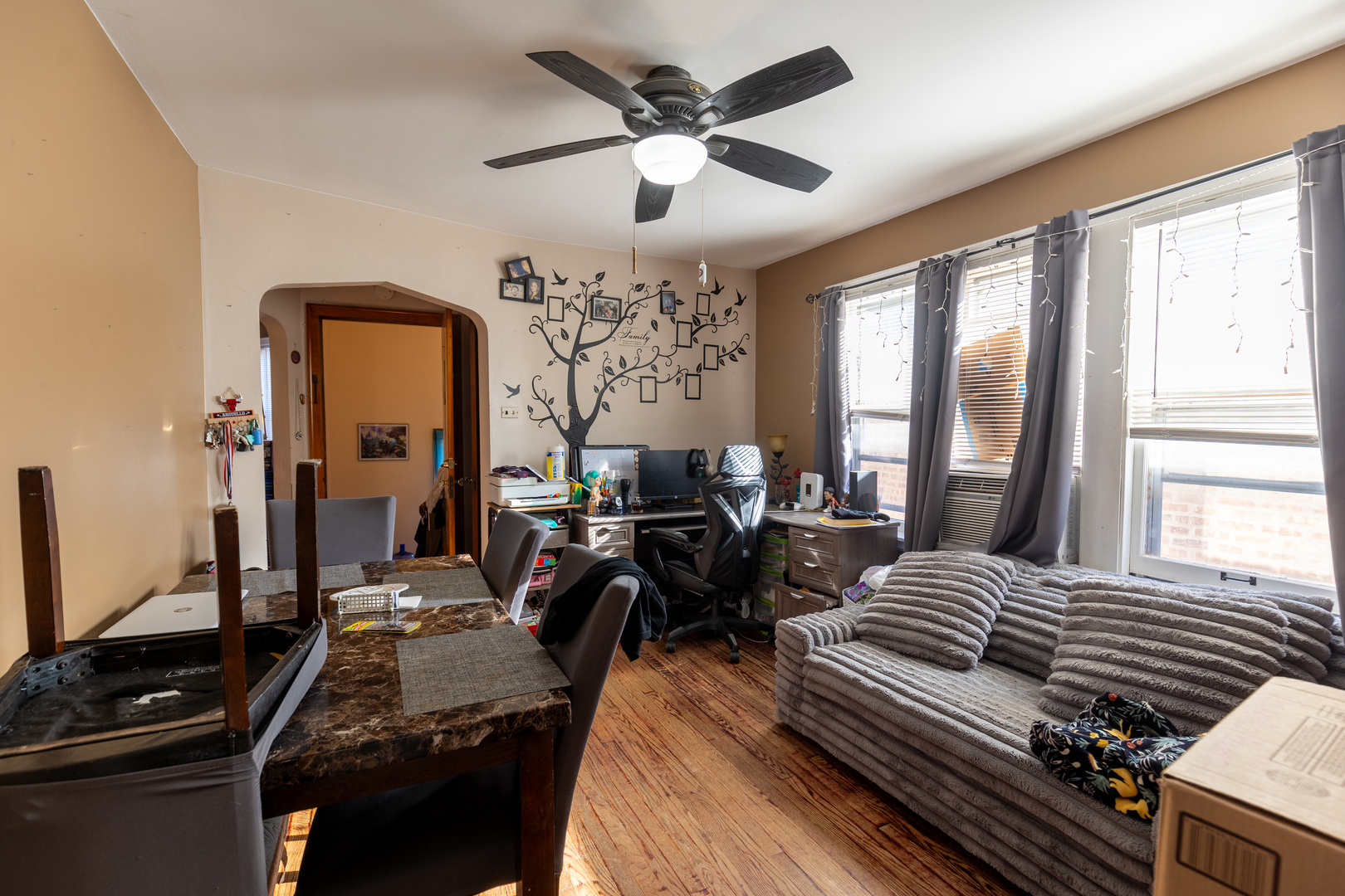 1626 Home Avenue Berwyn, IL 60402 - Photo 6 of 23 a living room with furniture and a window