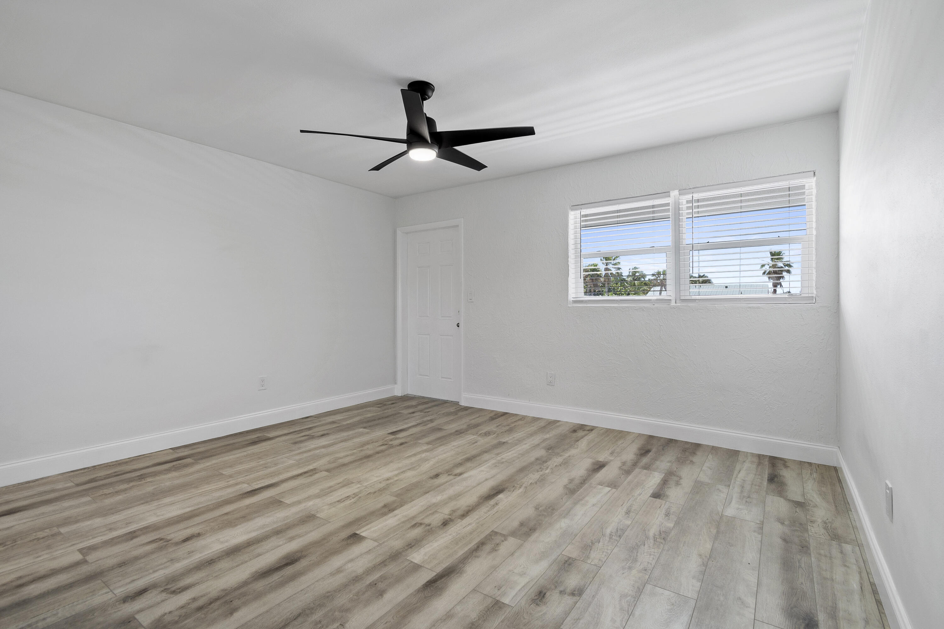 1115 South Ocean Drive, Unit 1 Fort Pierce, FL 34949 - Photo 17 of 48 a view of empty room with wooden floor