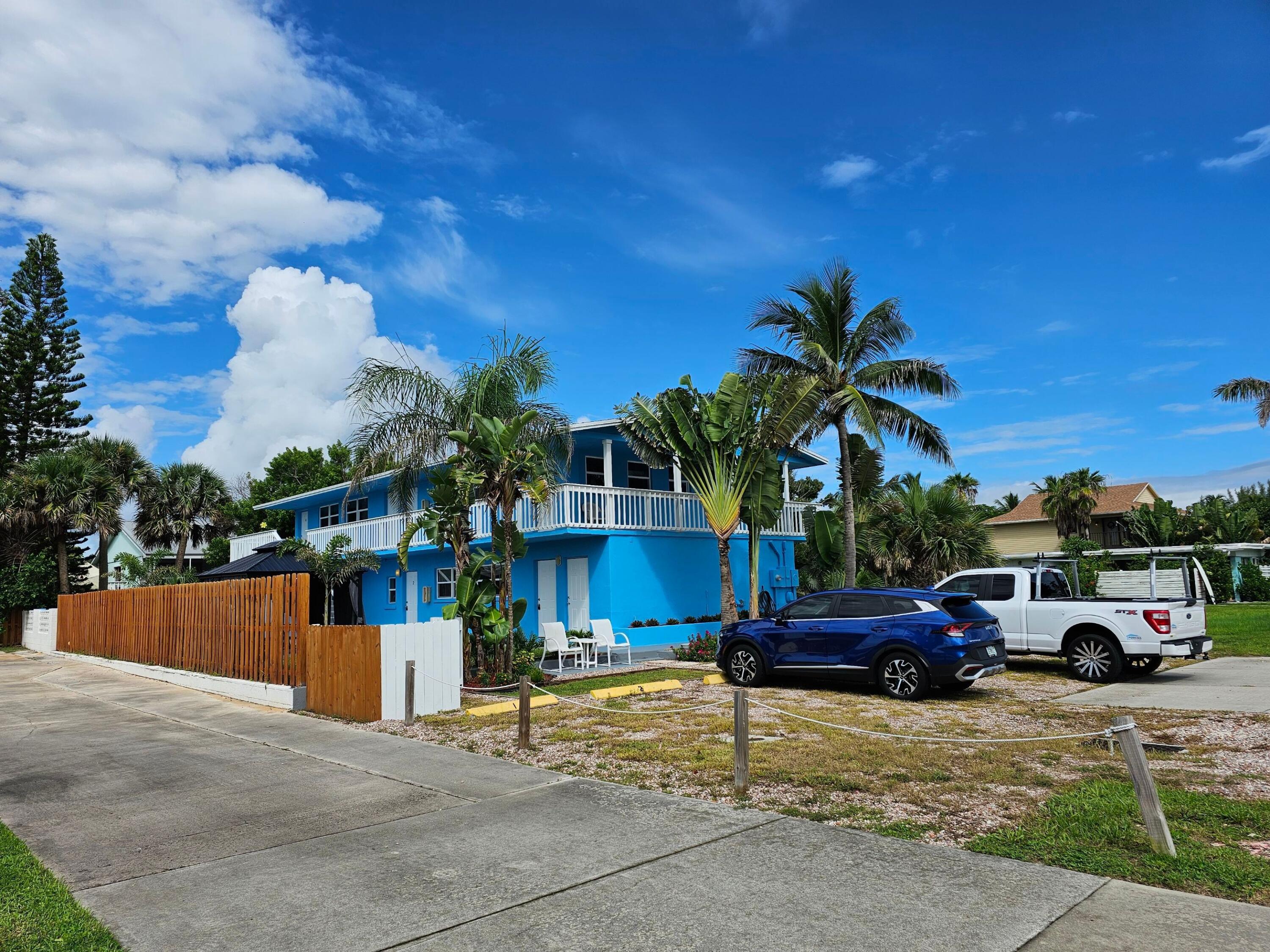 1115 South Ocean Drive, Unit 1 Fort Pierce, FL 34949 - Photo 2 of 48 a view of a car parked in front of a house