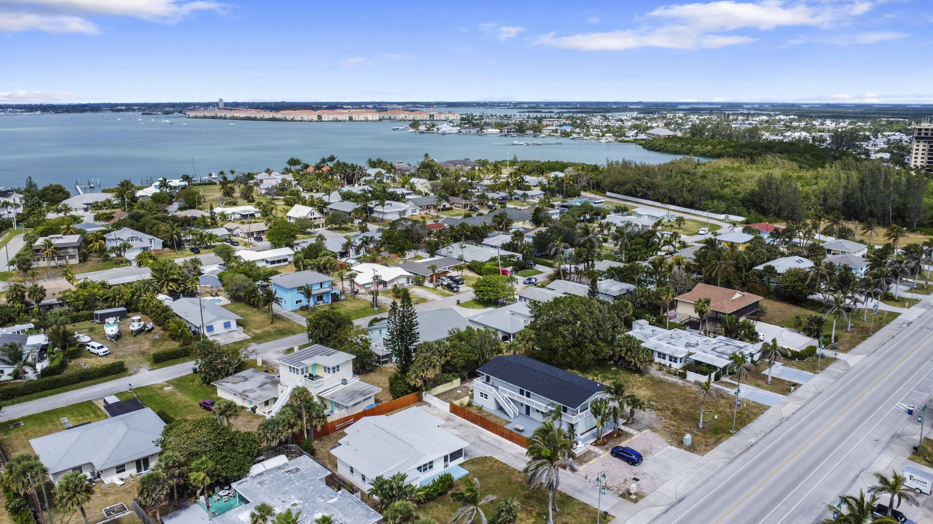 1115 South Ocean Drive, Unit 1 Fort Pierce, FL 34949 - Photo 25 of 48 an aerial view of a city with lots of residential buildings ocean and ocean view