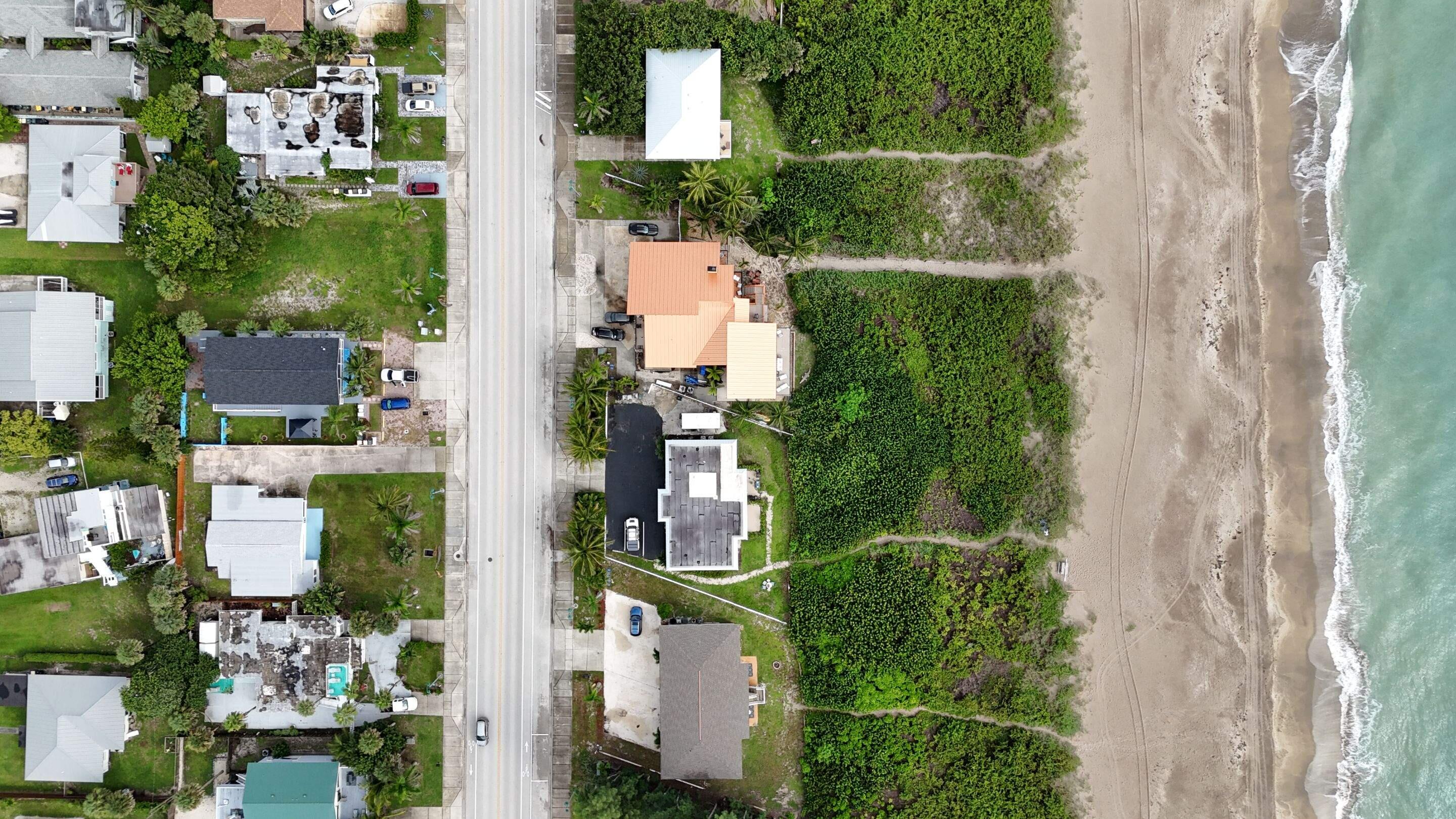 1115 South Ocean Drive, Unit 1 Fort Pierce, FL 34949 - Photo 4 of 48 an aerial view of residential house with outdoor space and street view