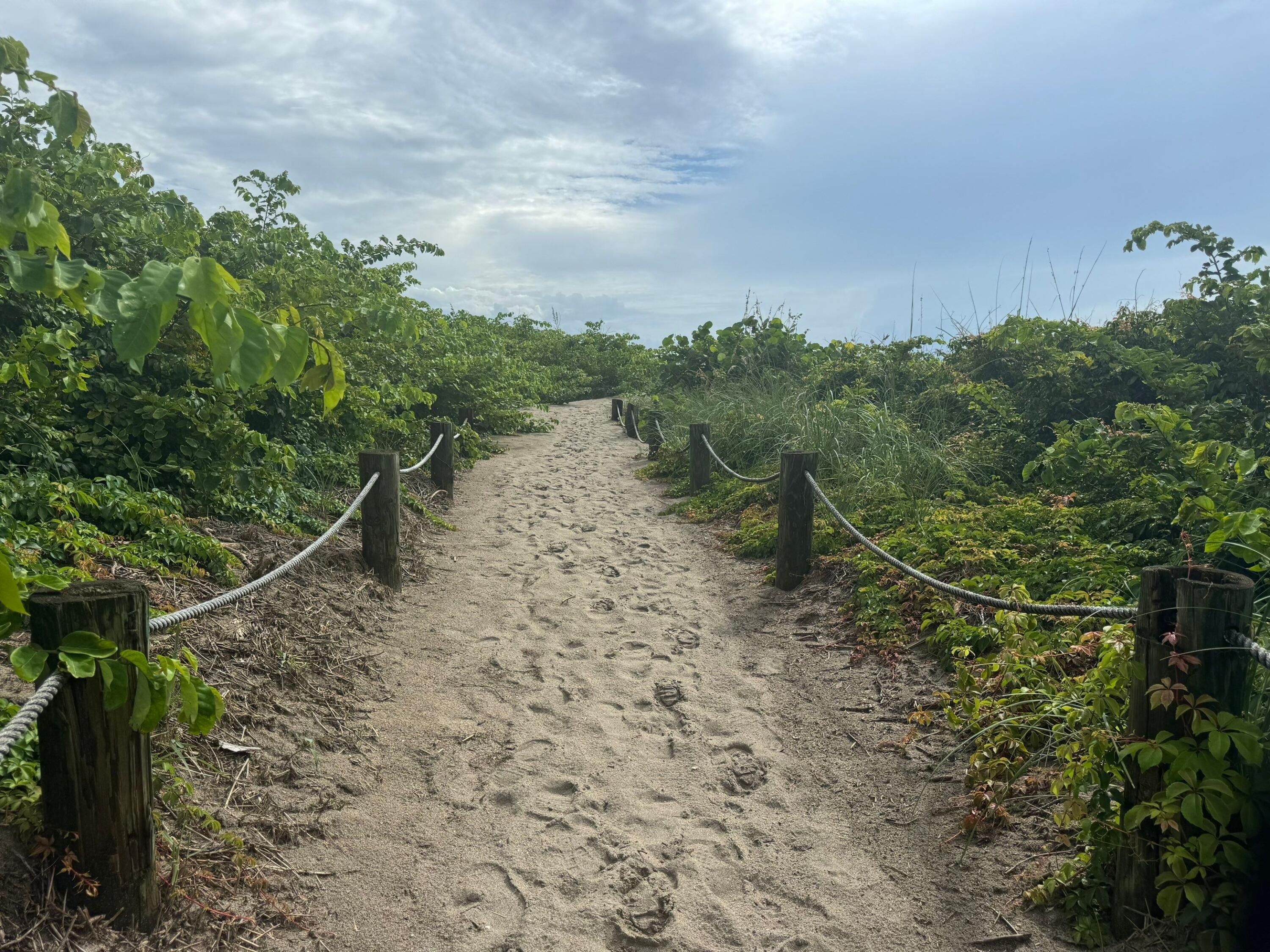 1115 South Ocean Drive, Unit 1 Fort Pierce, FL 34949 - Photo 5 of 48 a view of a yard with wooden fence