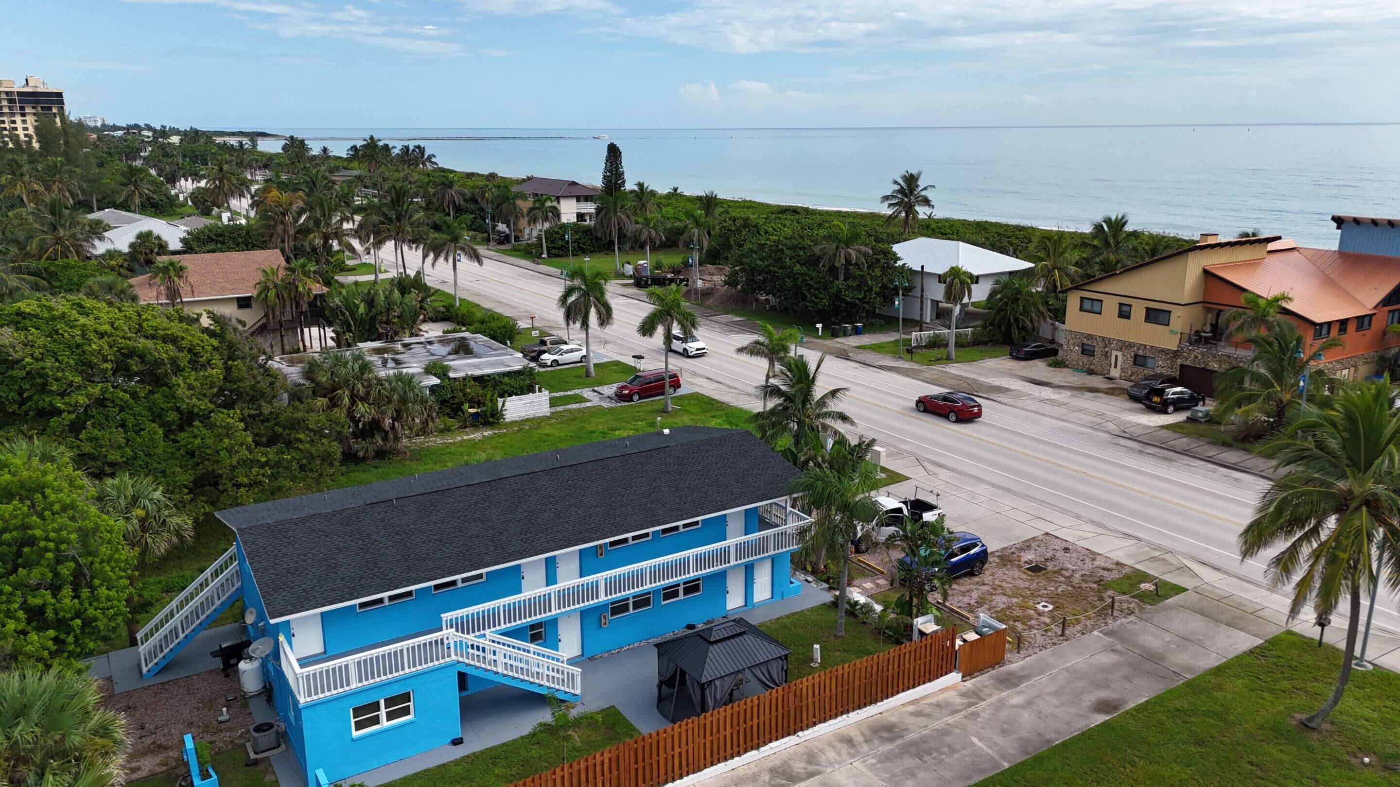 1115 South Ocean Drive, Unit 1 Fort Pierce, FL 34949 - Photo 7 of 48 an aerial view of a house with a garden view