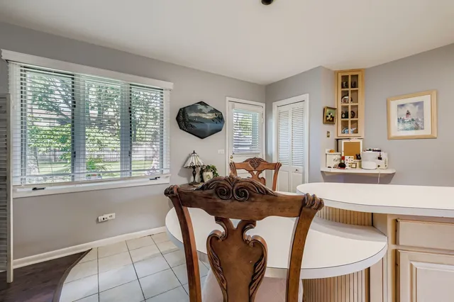 a living room with furniture fireplace and flat screen tv