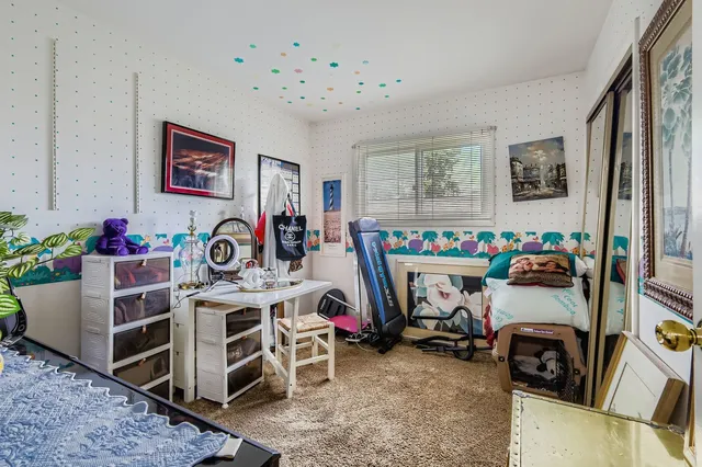 a bathroom with a sink vanity and a mirror