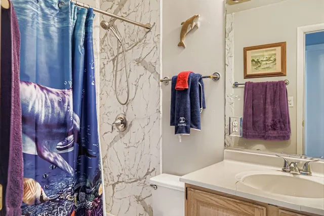 a room with furniture and a chandelier