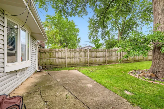 a view of a backyard with a garden