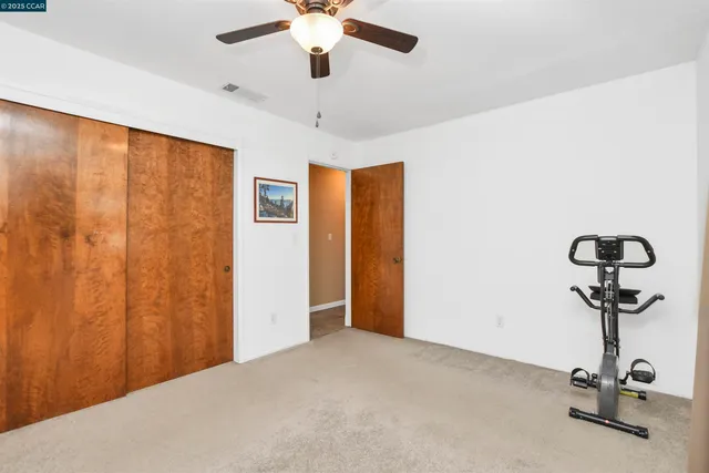 a view of a house with swimming pool and porch