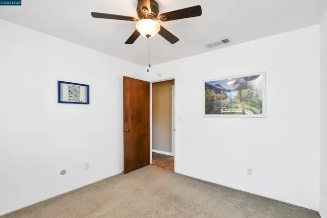 a view of a storage room with a utility room