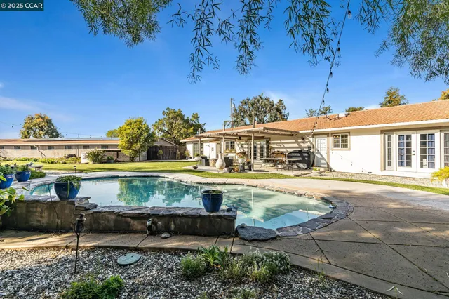 a view of a city with mountains in the background